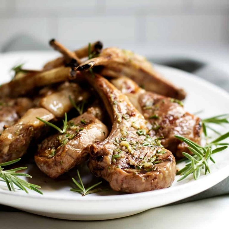 rilled-Lamb-Chops-on-a-white-platter-with-rosemary-sprigs-sq